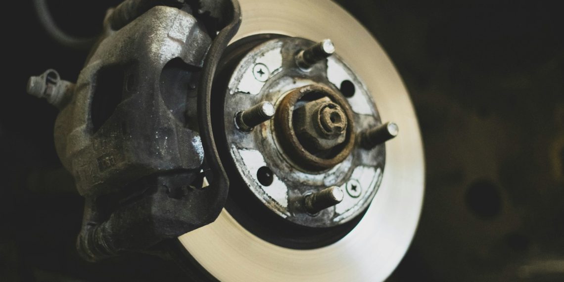 white and silver round device