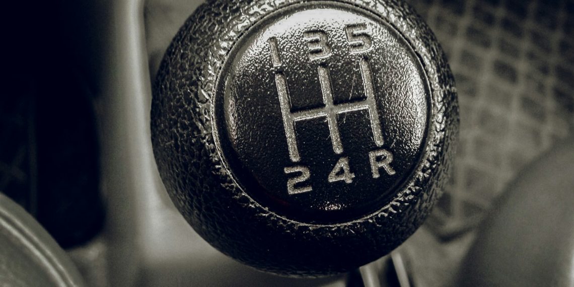 a close up of a car's gear stick